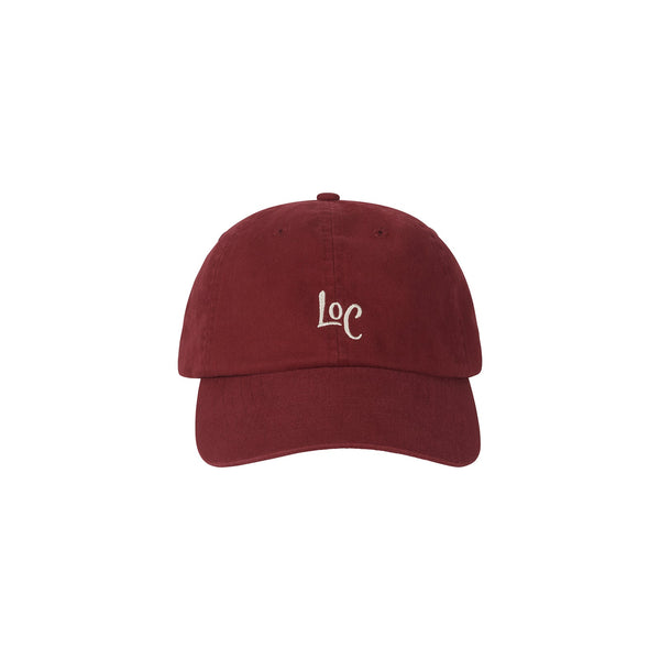 Red cotton cap with 'Loc' logo on the front