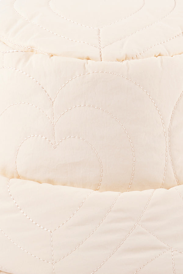 Cream puffer bucket hat with heart pattern detail